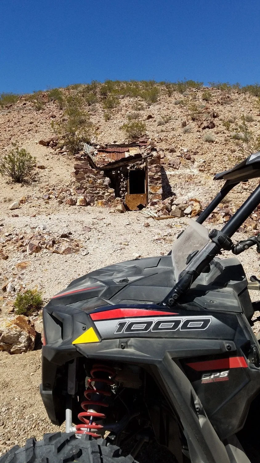 happy-trails-rental-polaris-rzr-in-front-of-csm-hut