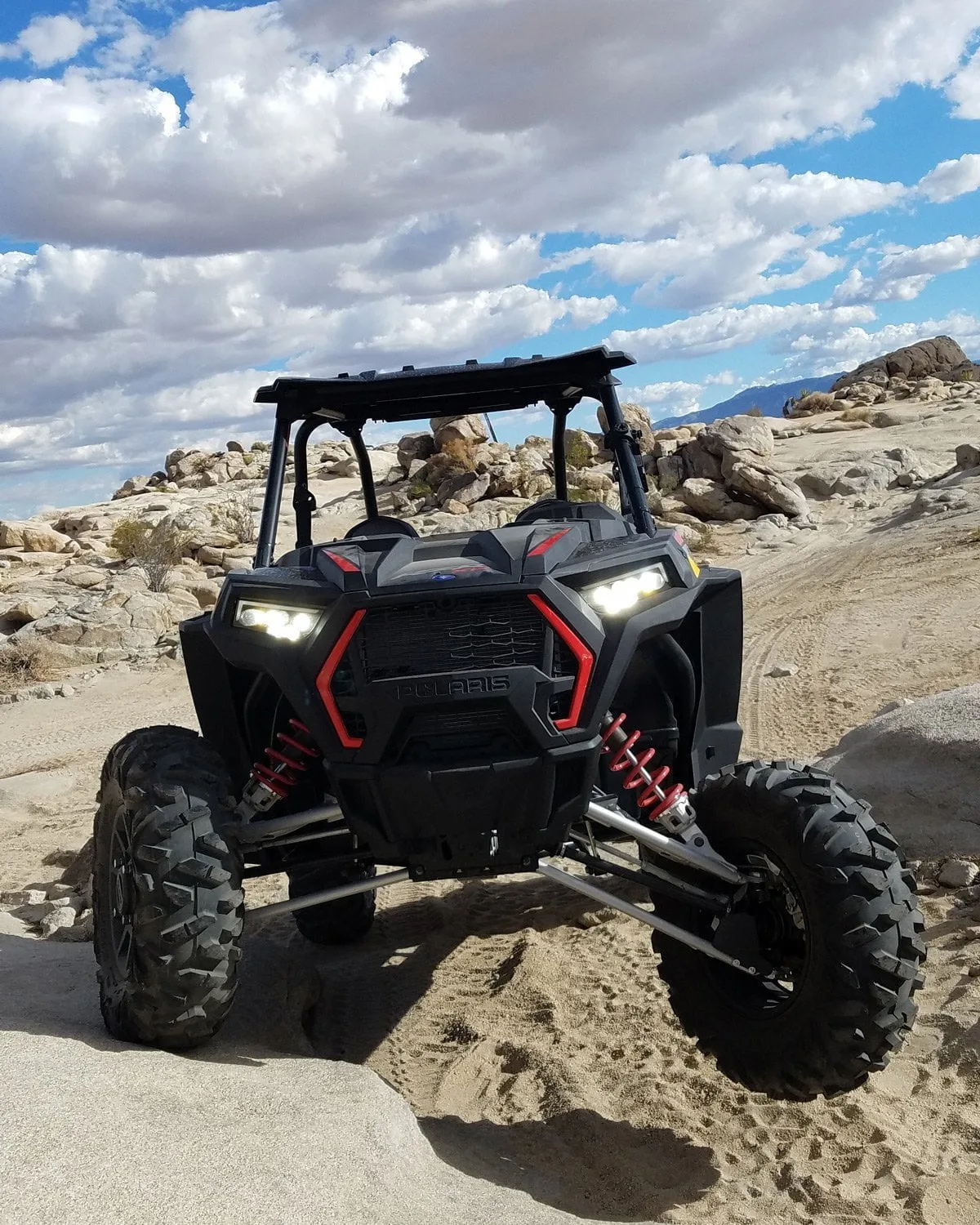 happy-trails-rental-polaris-rzr-with-one-wheel-up-in-air